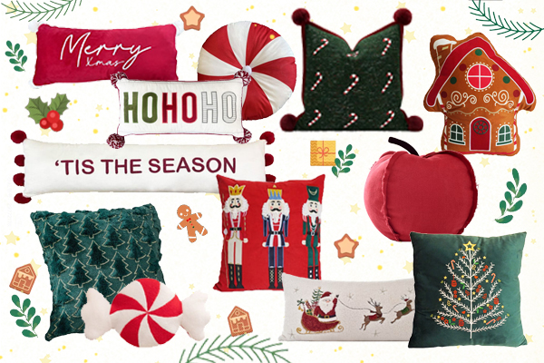 A cozy sofa with Christmas-themed pillows and a soft blanket