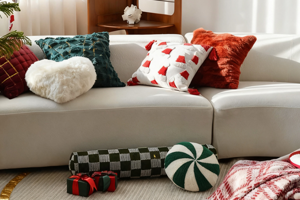 An antique illustration of holly leaves and berries.